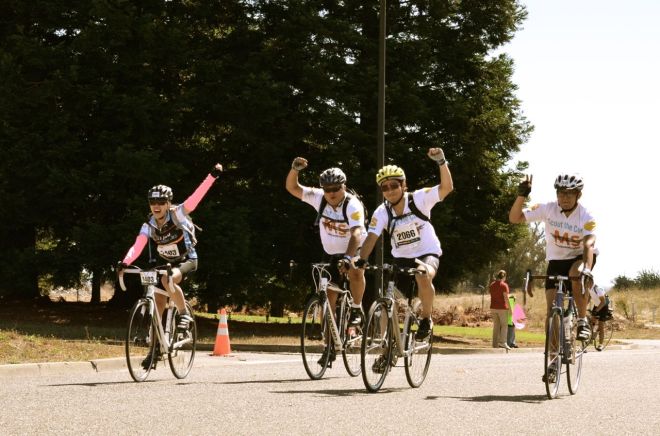 three fist pumps and a peace sign