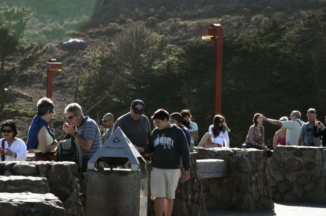 girl posing in the crowd at Golden Gate