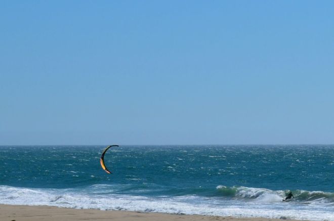 Wind surfer dropping in
