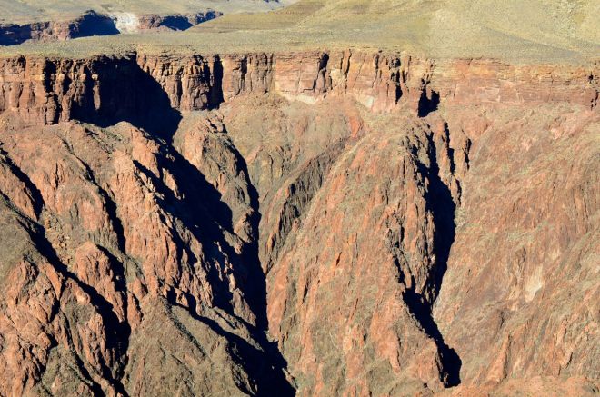 descending below the plateau